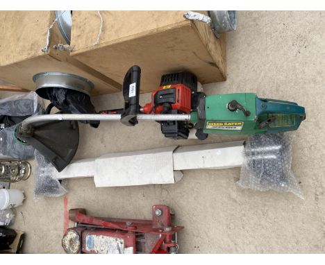 A PETROL ENGINE GRASS STRIMMER, A T-MECH STRIMMER BODY AND ROOF BARS 
