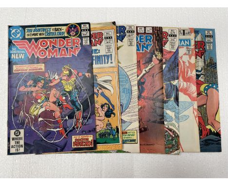 EIGHT  VINTAGE DC WONDERWOMAN COMICS FROM THE 1980'S 