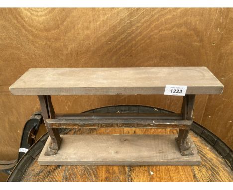 A VINTAGE PAPER ROLLER STAND 