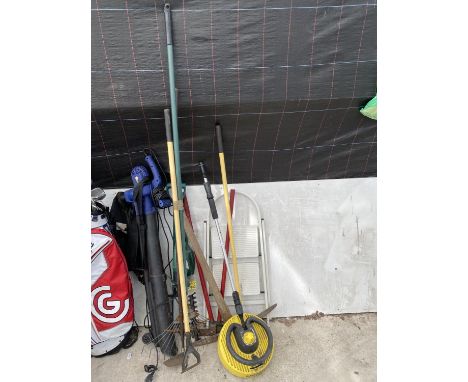 AN ASSORTMENT OF GARDEN TOOLS TO INCLUDE A LEAF BLOWER, SHEARS AND A PICK AXE ETC 