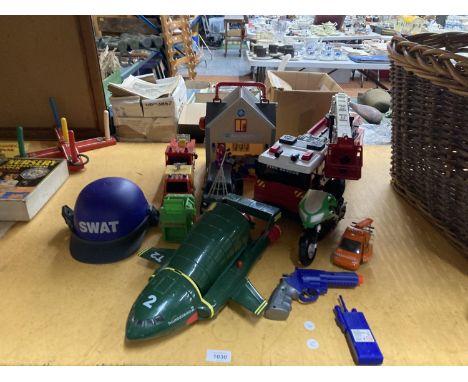A VARIETY  OF TOY VEHICLES TO INCLUDE A FIRE ENGINE, SPIDER MOBILE, AMBULANCE, AEROPLANE TOGETHER WITH A FIREMAN SAM FIRE STA