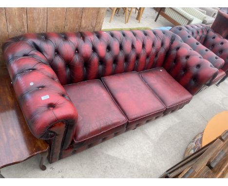 A MODERN OXBLOOD BUTTON-BACK CHESTERFIELD THREE SEATER SETTEE 