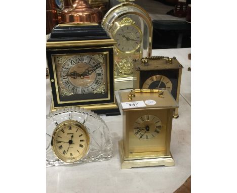 THREE CARRIAGE CLOCKS, A TIMEMASTER MANTLE CLOCK AND A CRYSTAL GLASS CLOCK 