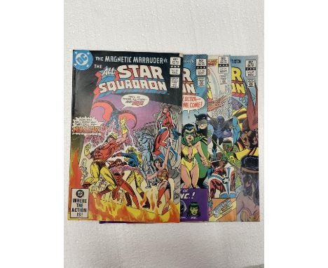 FOUR VINTAGE DC ALL STAR SQUADRON COMICS FROM THE 1980'S 