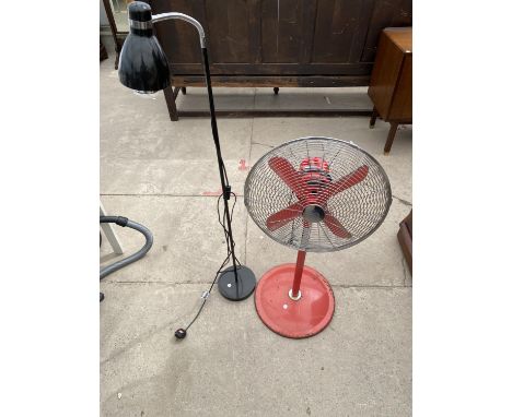 A FLOOR FAN AND A STANDARD LAMP 