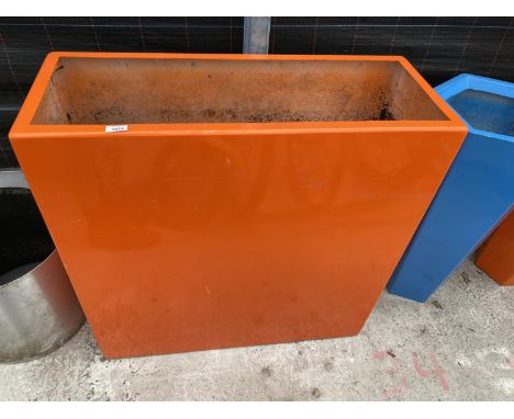 A VIVID ORANGE RECTANGULAR FIBRE GLASS PLANTER (H:90CM) 