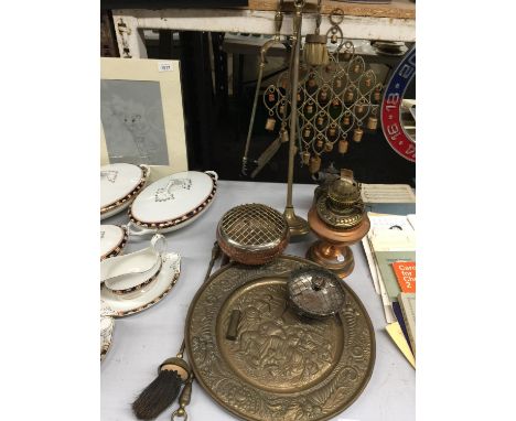 A COMBINATION OF BRASSWARE TO INCLUDE A COMPANION SET, WALL HANGING, OIL LAMP, ROSE BOWL, WINDCHIME ETC., 