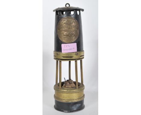 A late 19th / early 20th Century Ackroyd and Best Hailwoods Improved Lamp no. 826 of ebonised brass construction lamp with ap
