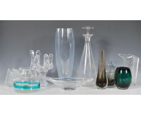 A collection of mixed retro glassware mostly clear glass examples to include a Whitefriars clear glass jug and decanter, bubb