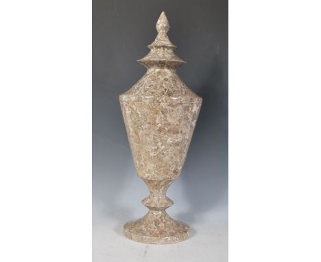 A 20th Century polished marble / granite urn of Pagoda form, raised on a circular base with the body of tapering pagoda form 