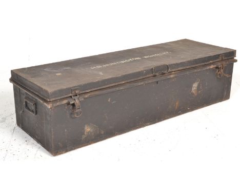 An early 20th Century ebonised metal military trunk / strong box having ' Huntington Whiteley ' inscribed to the lid, having 
