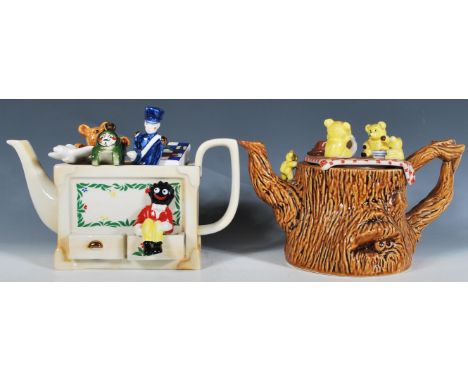 A pair of Cardew collectors novelty teapots to include a ' Toy Box ' teapot modelled with various toys protruding from a box 