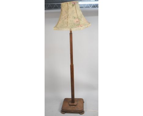 An Art Deco Oak Standard Lamp, Shade AF 