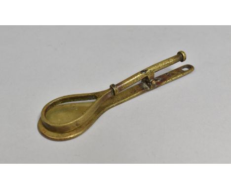 A Late Victorian/Edwardian Novelty Brass Door Knocker in the Form of a Tennis Racket, 12cms High 