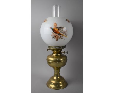 A Mid 20th Century Brass Oil lamp with Opaque Glass Shade Decorated with Pheasants, 48cms High 