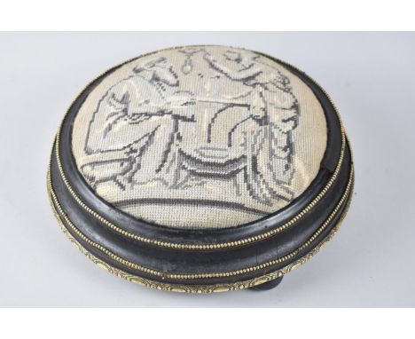 A 19th century Brass Banded Ebonized Circular Footstool with Replacement Tapestry Top, 32cms Diameter, Three Ceramic Ball Fee