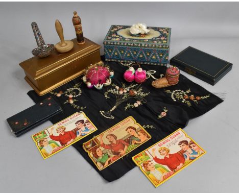 A Collection of Sundries to include Two Tins, Embroidered Panels, Pin Cushions, Needles, Manicure Tools Etc 