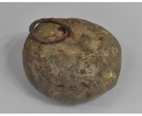 A 19th century Heavy Stone Weight or Doorstop with Iron Ring Carrying Handle, 12cms Wide 