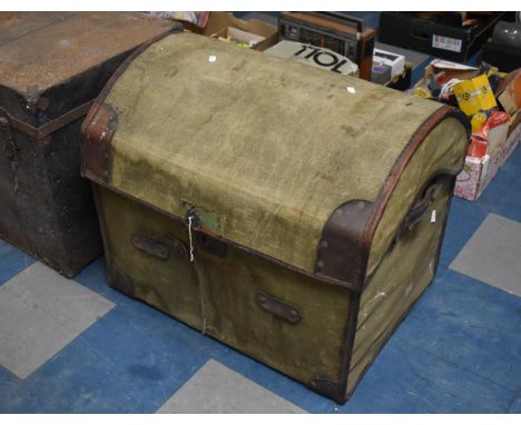 A Vintage Canvas and Leather Dome Topped Travelling Trunk, 59cms Wide and 58cms High with Fitted Interior, with Makers Label 