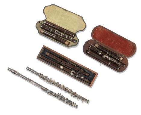 A George IV silver mounted cocus wood fluteby J D Goodlad, London 1828,The keys individually hallmarked, section bands and en