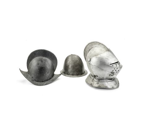 A German Comb Morion, a 'Spanish' Cabasset, and a reproduction close-helmetThe first and second late 16th centuryThe first of