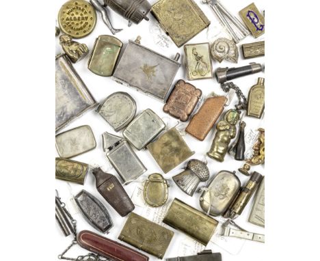 A collection of smoking related lighters, vesta cases and pipe tampersIncluding a table lighter presented to Major General La