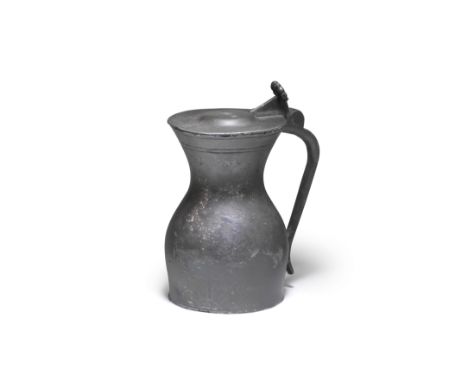 A rare Henry VIII pewter lidded measureCirca 1540 The central shallow dome of the 'flat' lid stamped with initials, a plume-s