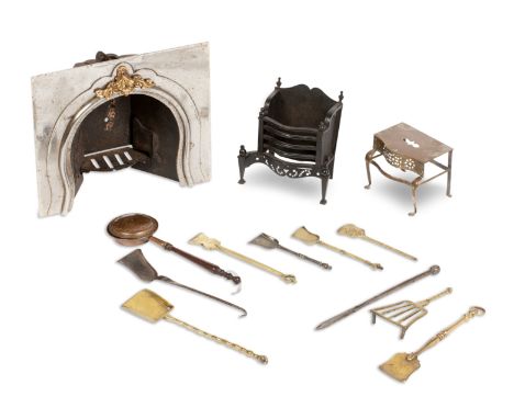 A collection of miniature fireside and domestic tools19th centuryIncluding a steel and brass fire surround, a blackened iron 