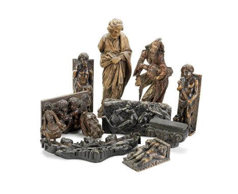 A collection of carved walnut and fruitwood figures and reliefs17th century to late 19th century Comprising of a pair of carv