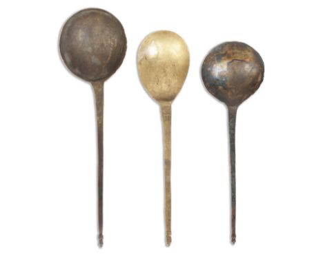 Three rare latten filed proto-acorn knop spoons14th/15th centuryOne stamped to the stem with a crowned hammer, another stampe