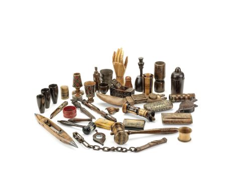 A collection of treenIncluding a 19th century penwork snuff box, marked Smith, Mauchline, five pieces of tartanware, an artic