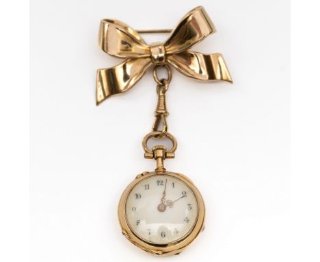 Franrijk, 18 kt. gouden dames remontoir horloge, met een gouden binnendeksel. Aan een gouden strikbroche. bruto 15,2 gr. diam