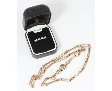 Am early 20th century rose gold dual link watch chain with spring loop, each link individually stamped, 19.53g, together with