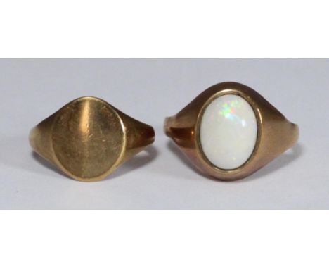 A 9ct gold gent's opal signet ring and another 9ct signet rings, 11.2g 