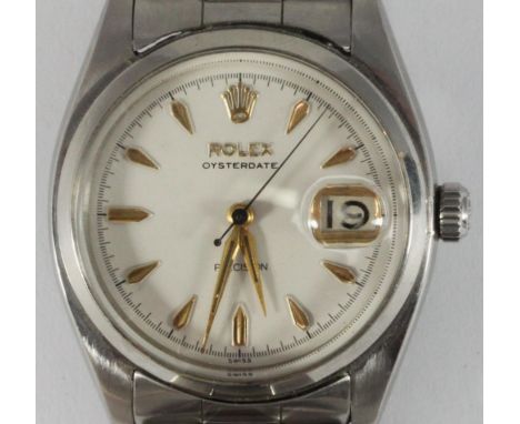 A gents stainless steel Rolex Oysterdate Precision wristwatch, ref. 6494, c.1956, the white enamel dial with applied gold bat