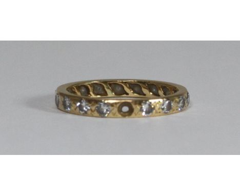 An 18ct gold and diamond eternity ring set with 17 x 0.05 diamonds, total diamond weight approximately 0.85cts, gross weight 