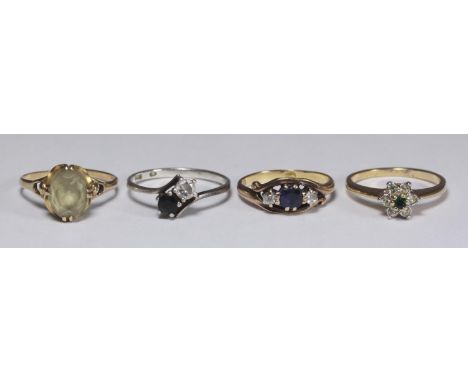 Four various rings including an 18ct gold ring, gross weight approximately 3.4g and a 9ct gold ring, gross weight approximate