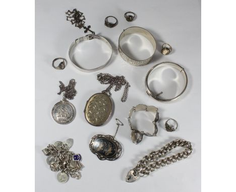 Silver jewellery comprising three bangles, a curb-link bracelet, charm bracelet, locket and necklace, LSGC medal on chain and