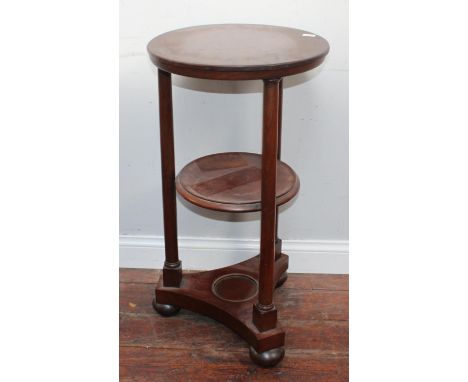 A 19th century Biedermeier style circular two tier occasional table with Doric column supports, together with a carved and st