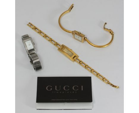 A ladies stainless steel Gucci '8600L' model wristwatch, with rectangular pearlescent dial flanked by two banks of diamonds t