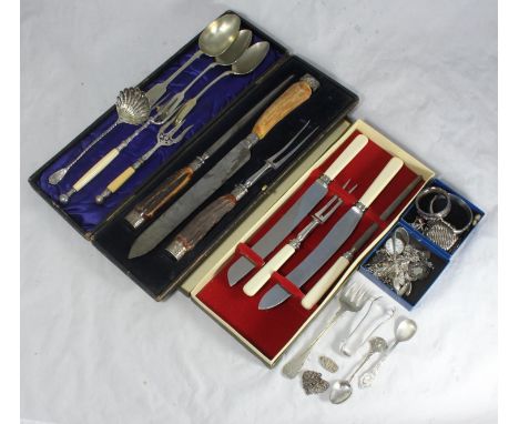 A collection of assorted silver items including a charm bracelet, pendants, cufflinks, bangles, a napkin ring, a vesta case a