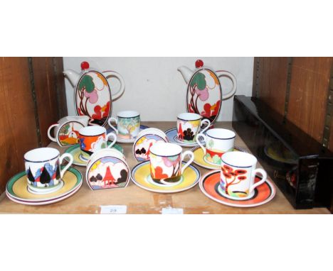SECTION 29. A boxed set of eight Clarice Cliff porcelain napkin rings, together with a limited edition Wedgwood Clarice Cliff