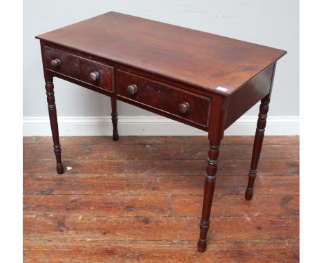 A 19th century mahogany side table, of rectangular form with two frieze drawers, turned pulls and turned supports, 91cm wide 