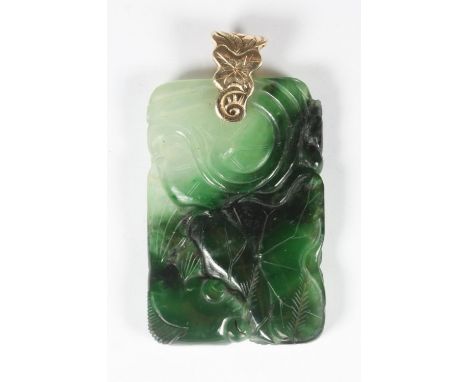 A jade coloured pendant of rectangular form, with leaf-moulded decoration, on yellow metal (tests as 9ct gold or above) suspe