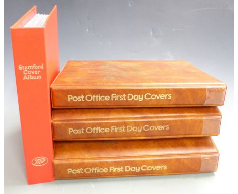Three specialist Post Office first day cover albums (one empty) and a Stamford cover album of GB covers