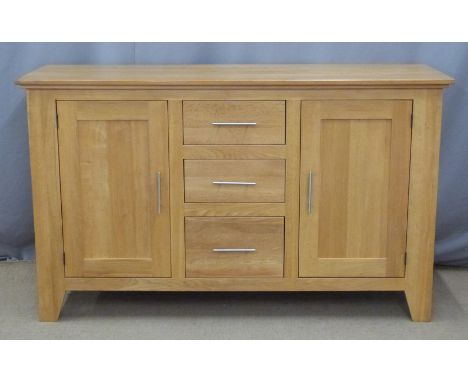 Contemporary light oak sideboard with three drawers flanked by cupboards, W150 x D48 x H85cm