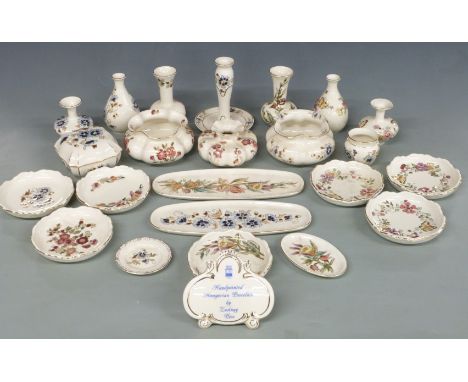 A collection of Zsolnay Pecs porcelain including trinket boxes, dishes, vases, Zsolnay advertising sign, vases etc tallest 14