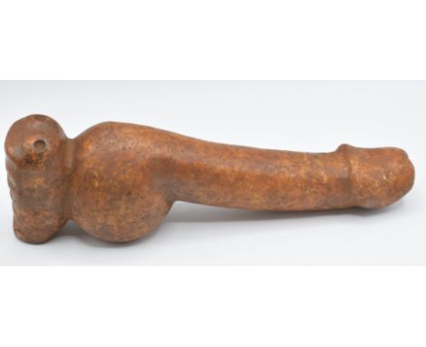 A hardstone model of a phallus, 26cm