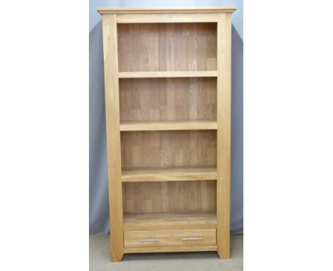 Contemporary light oak bookcase with drawer under, W99 x D36 x H191cm