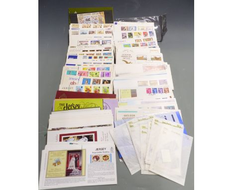 A quantity of loose Channel Island and Isle of Man first day covers